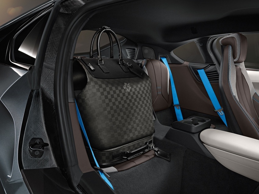 The BMW i8 hybrid plug in with gullwing doors. Comes with Louis Vuitton  luggage, too.